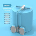 Blue portable intelligent foot pedal pull device for home fitness on a wooden floor.