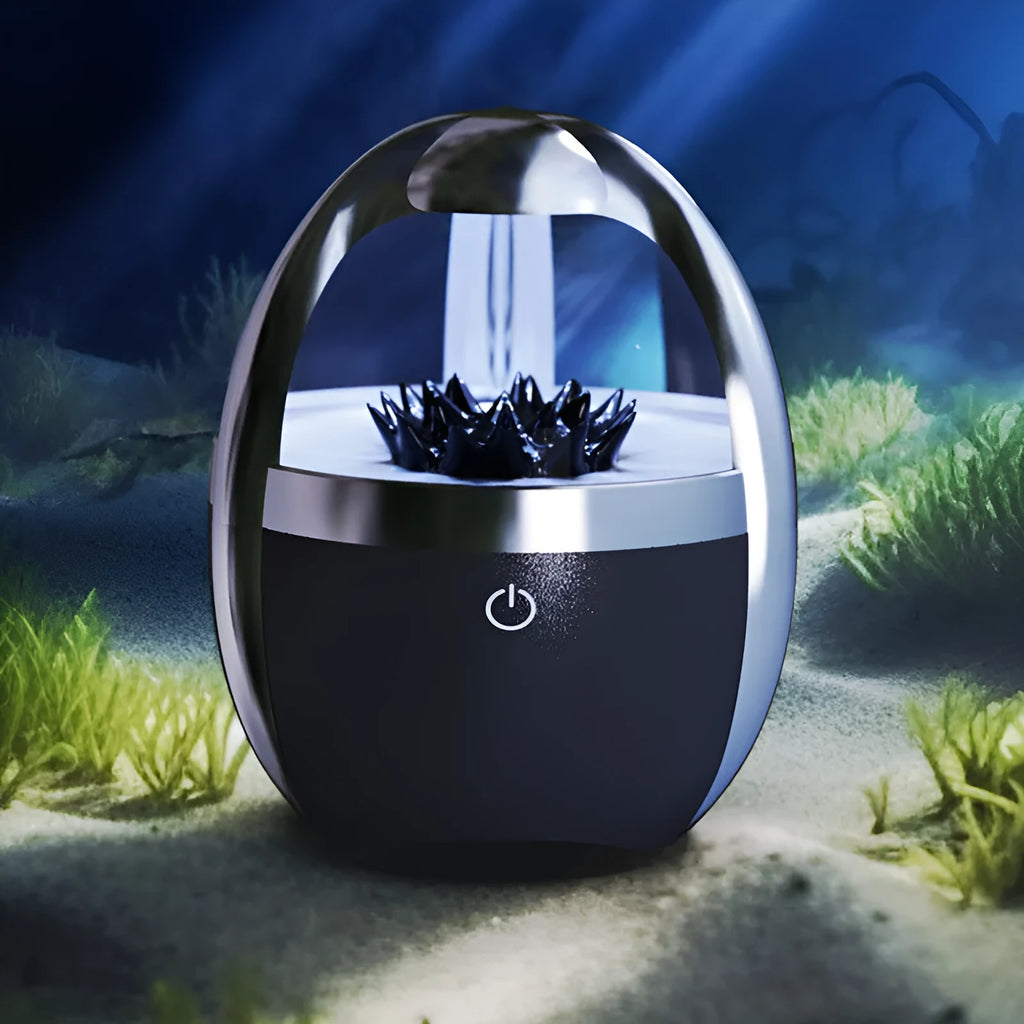 Magnetic fluid Bluetooth speaker in silver black with transparent glass and solid wood bracket