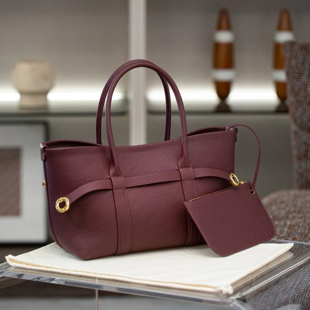 Women's genuine leather single shoulder handbag in horizontal square shape with stitching detail
