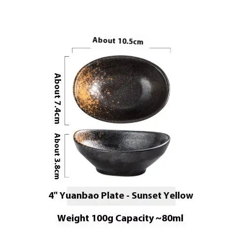 Oval-shaped Japanese ceramic sauce dipping bowl with an underglaze decorative pattern.