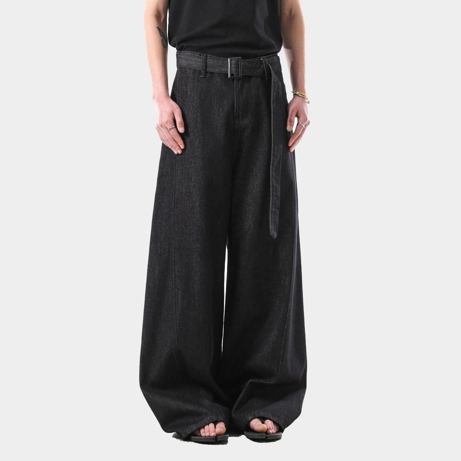 Black high waist straight leg jeans with a zip fly, shown flat.
