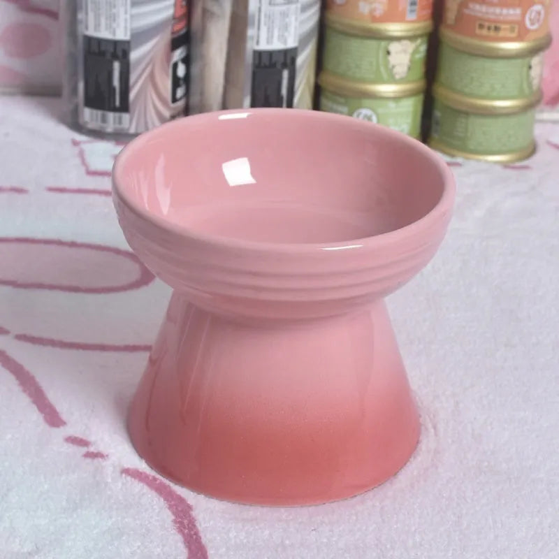 Black ceramic pet bowl with a high foot and neck protector to prevent tipping, shown with flat and slanted rim options.
