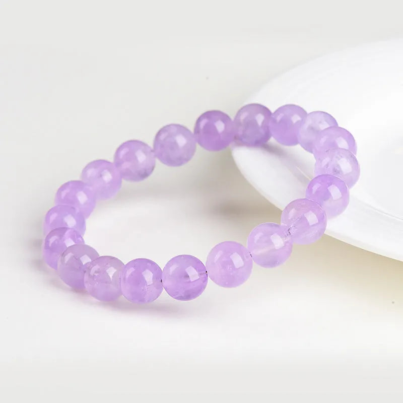 Lavender amethyst crystal bracelet with round beads in water ripple geometric design