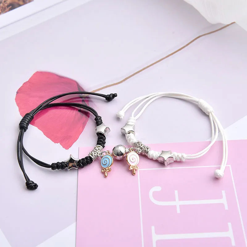 Magnet couple bracelets with electroplated finish showing magnetic clasp and symbolic design options