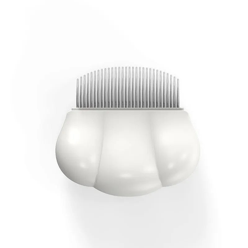 Blue Paw Soft deshedding brush for cats and dogs on a white surface.