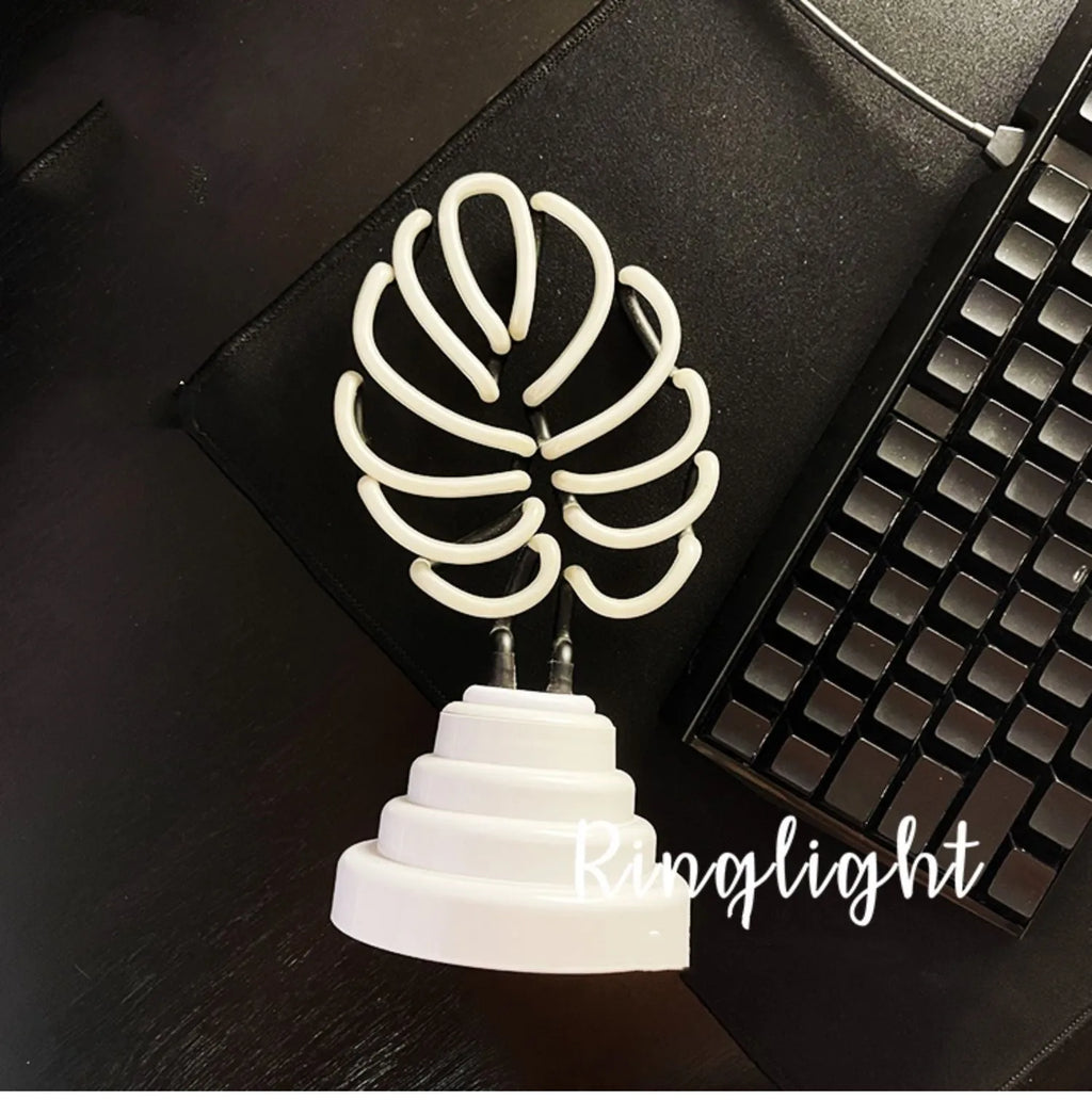 White bamboo shape desktop lamp with green light, USB plug connection