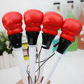 Four black pressure relief boxing press ejection pens with plug-in sleeve mechanisms on a desk.