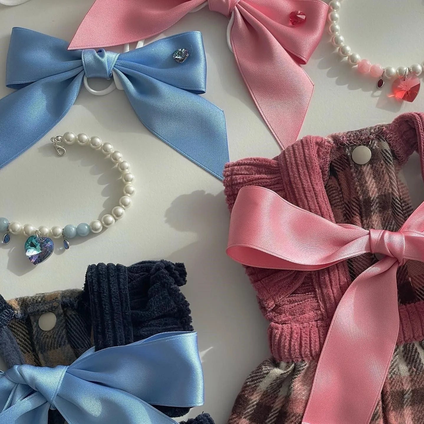 Princess style adjustable bow dog headband in blue colour on small dog