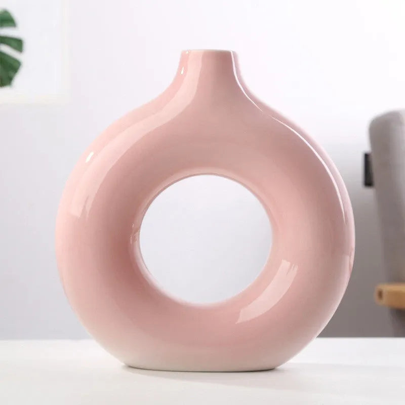 Unglazed porcelain biscuit vase with frosted particle surface in neutral colour