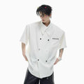 Men's loose fit casual short-sleeved shirt in white with lapel collar and decorative details