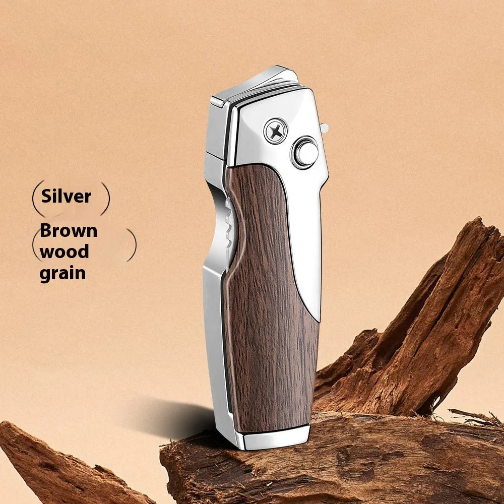 Zinc alloy metal folding lighter tool with integrated knife, shown in a carbon fibre finish.