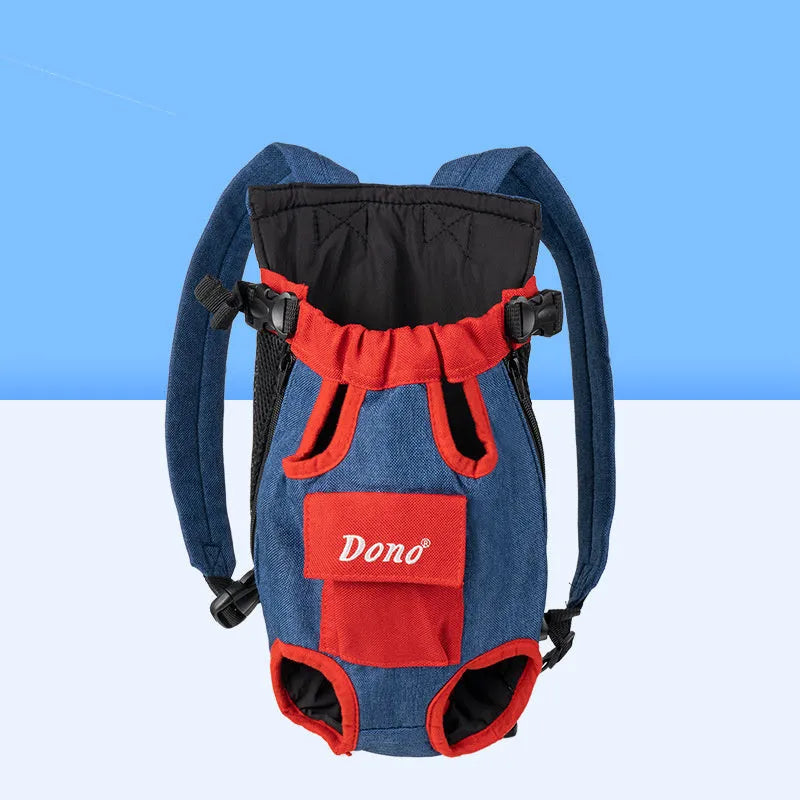 A person wearing a blue and yellow front-carry pet sling backpack containing a small dog, with adjustable cross-shoulder straps.