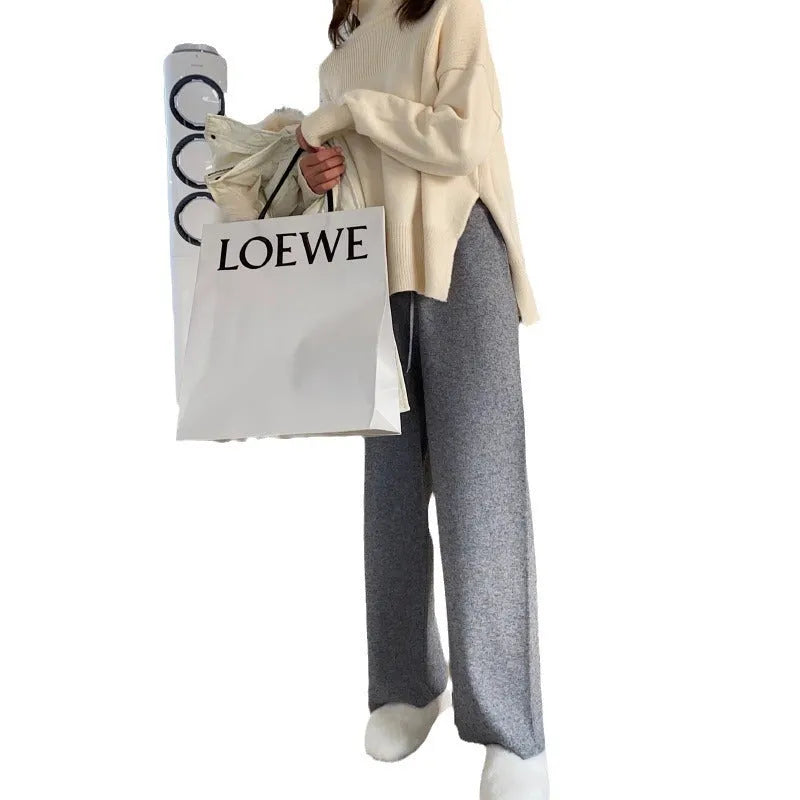 Women's thick knitted wide-leg winter trousers in straight-leg style with elastic high waist