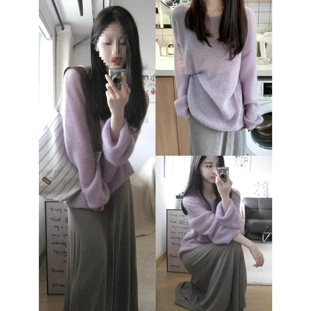Purple women's blouse with hollow out design and princess sleeves on a hanger.