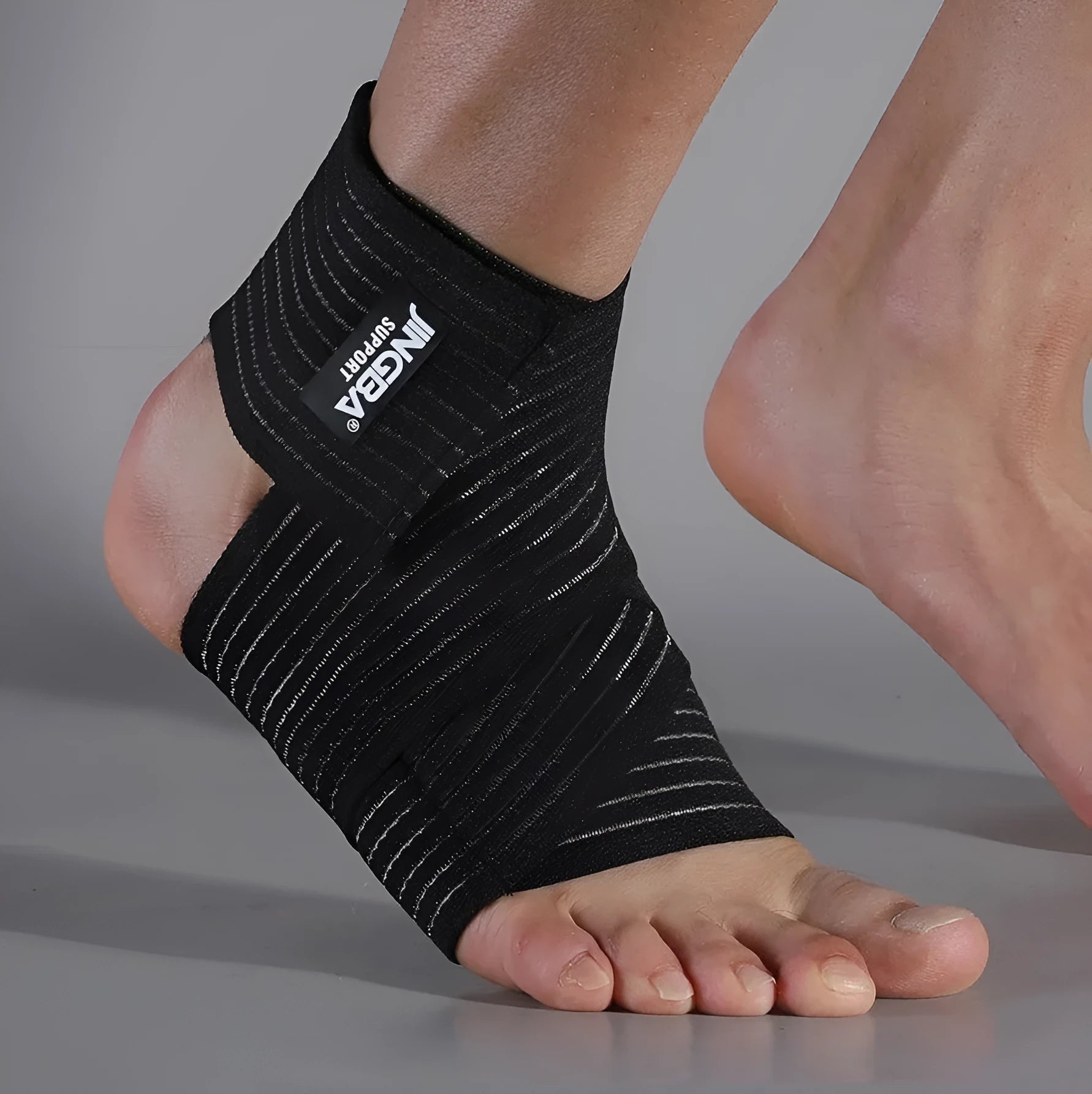 Adjustable black and khaki sports ankle support bandage for running and fitness
