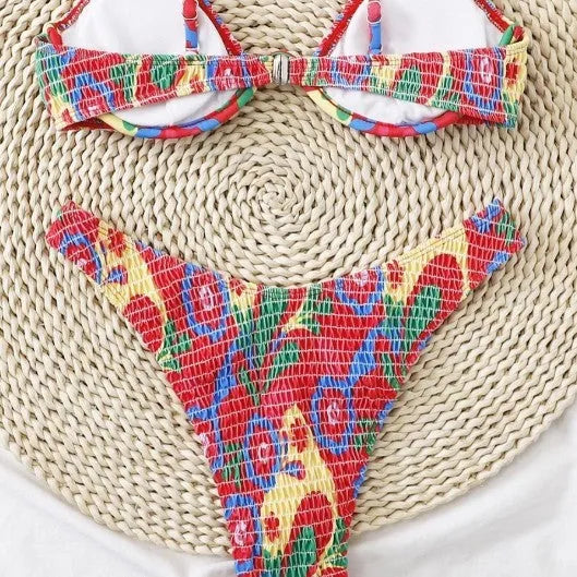Red floral print women's two-piece underwire bikini set on a mannequin.