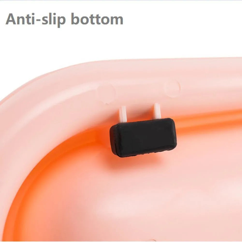 Green dual-compartment pet bowl with removable stainless steel insert and non-slip silicone base