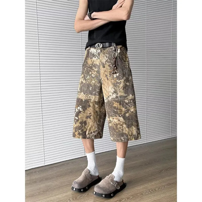 Yellow snake pattern camouflage cropped jeans in cotton denim.