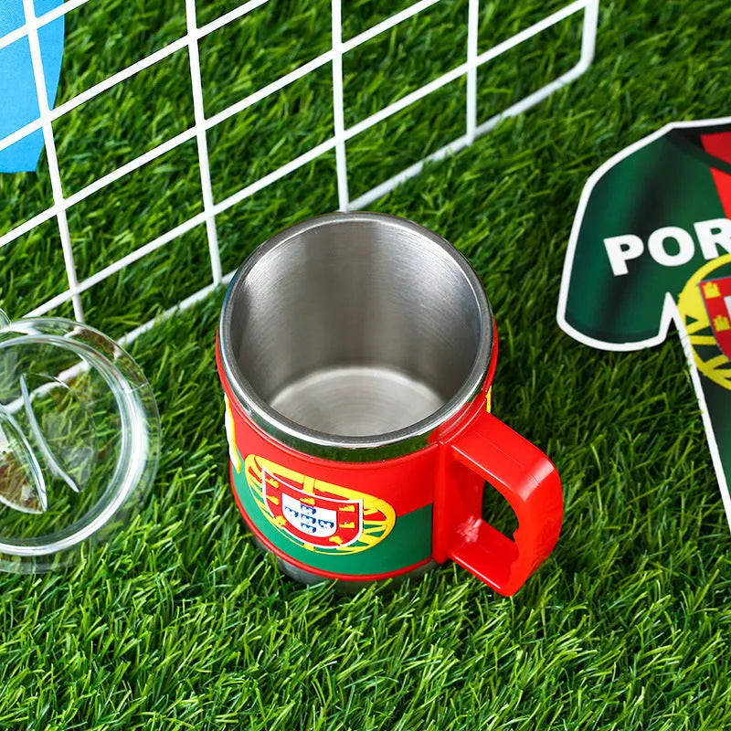 World Cup soccer mug souvenir in team colours, rubber and metal construction, 7.6cm diameter