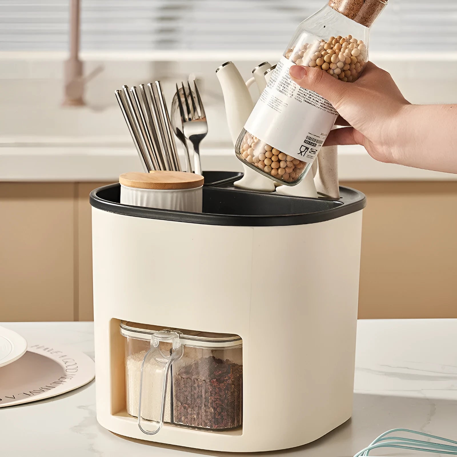 Rotating kitchen storage organiser with spice box compartments on countertop