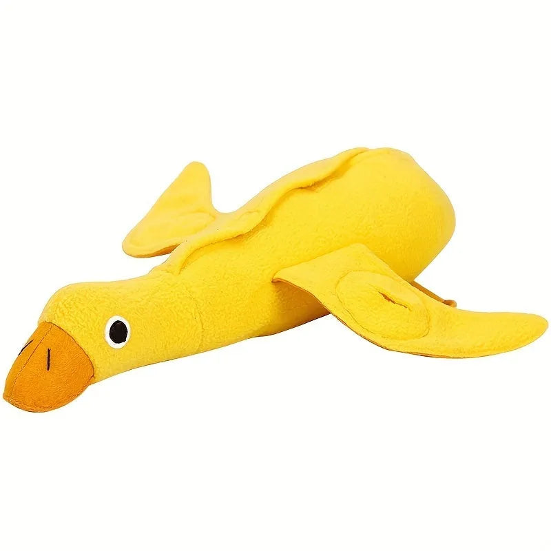 Yellow teddy dog training toy with integrated duck doll and food leak design for scent work
