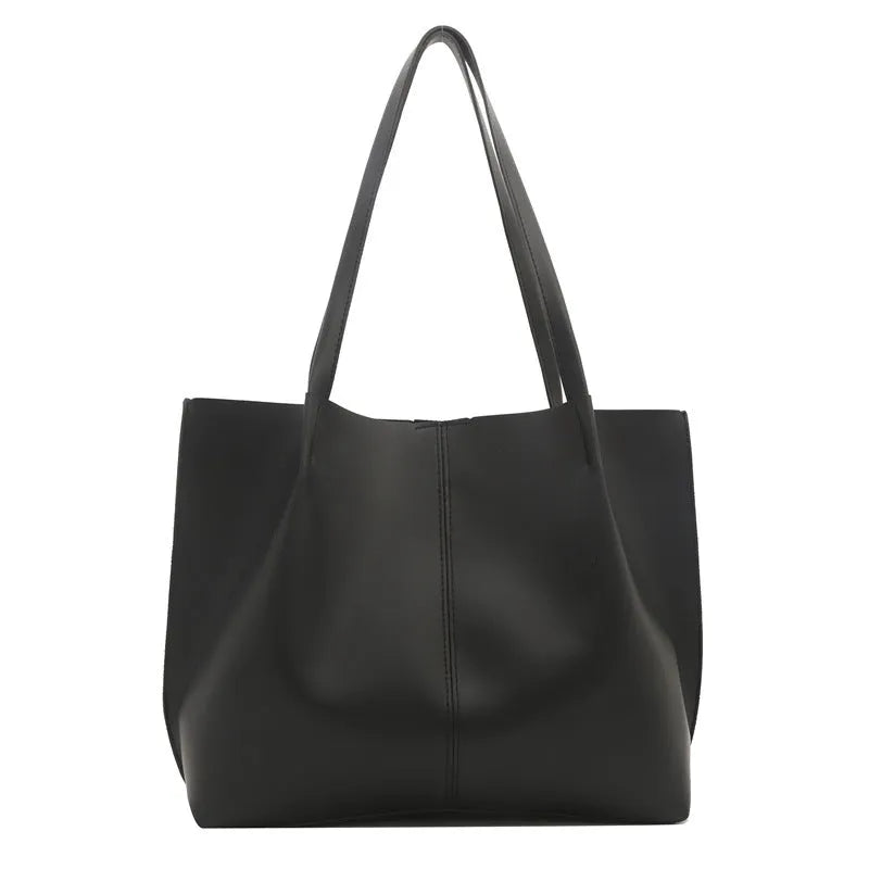 Casual messenger bag in PU leather with stitched detail, bucket shape, double shoulder straps, available in black brown coffee white