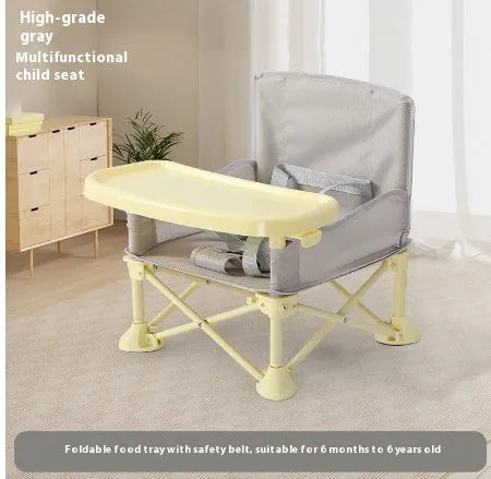 Foldable baby dining chair with safety belt, removable tray, and storage bag in pink