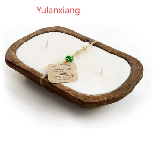 Retro wooden basin containing a soy wax aromatherapy candle with three wicks.