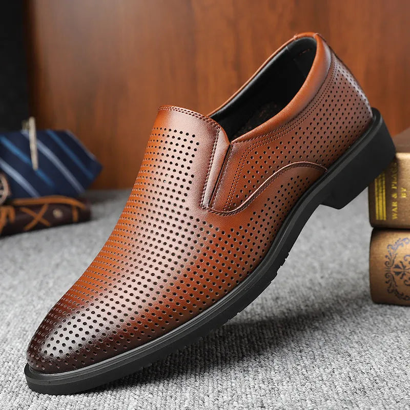 Men's black leather slip-on loafers with a rubber sole and leather toe cap on a white background.