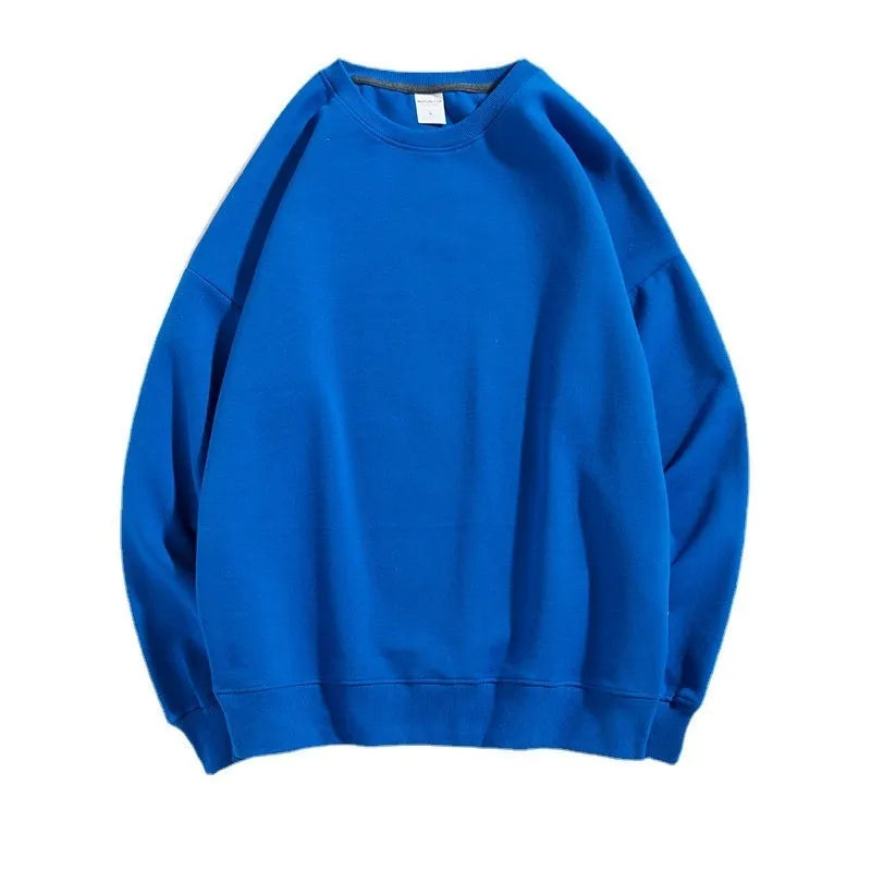 Cotton off shoulder pullover sweater in a loose fit, shown in a solid colour with long sleeves.