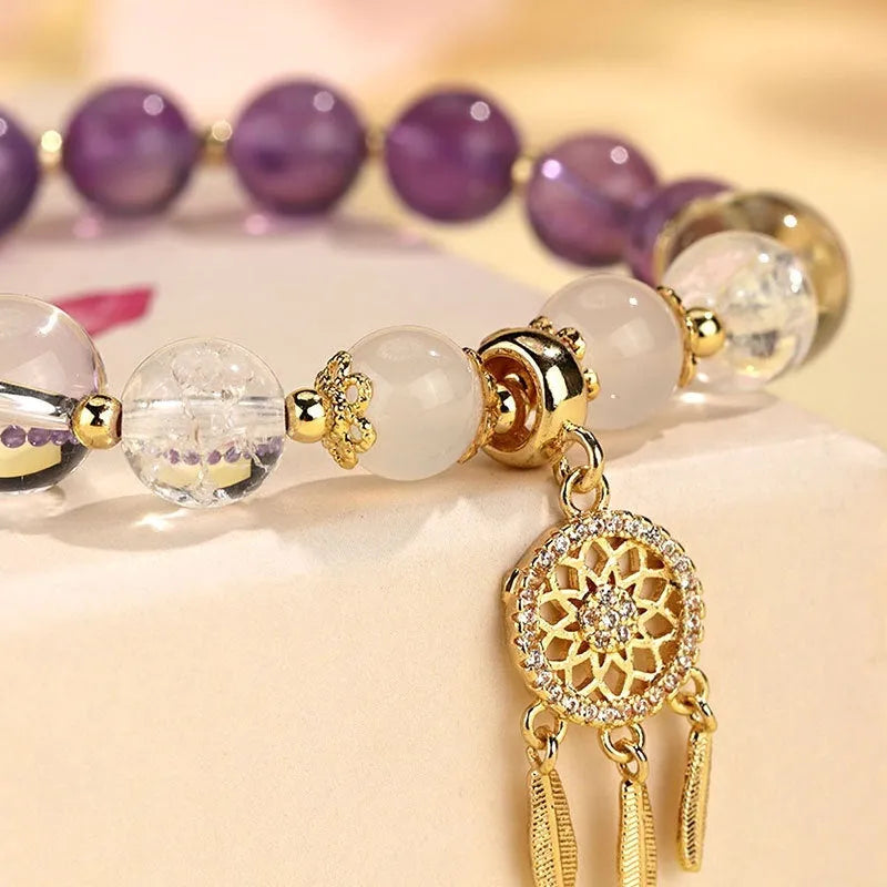 Chinese style crystal tassel bracelet in seven colour variations with electroplated finish and diamond-shaped elements