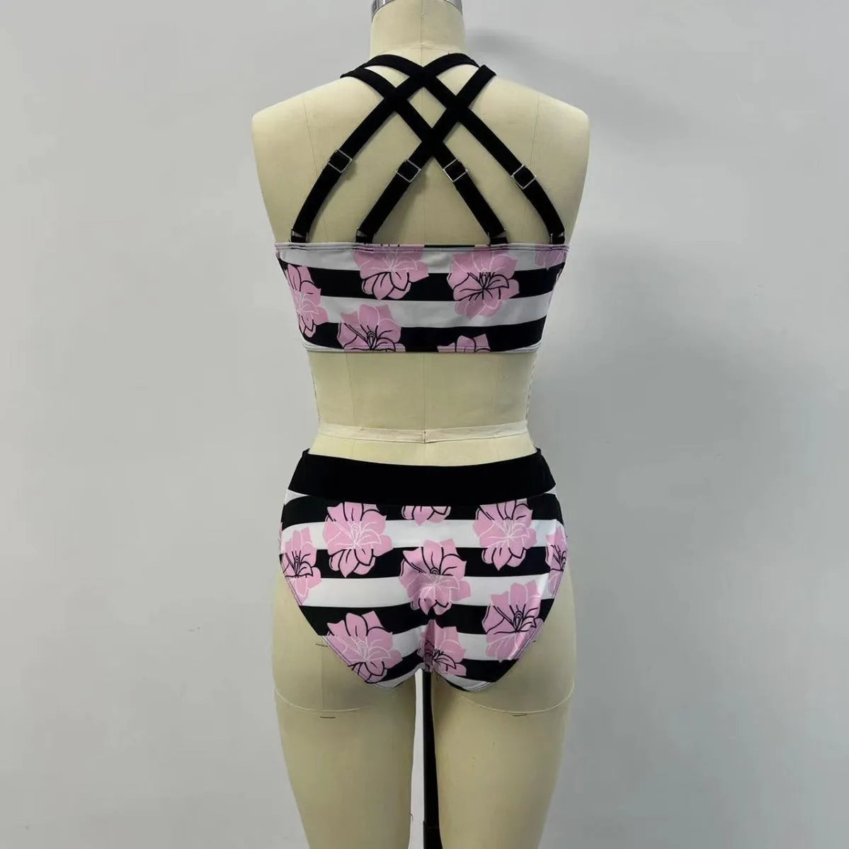 Black women's high-waisted bikini with belly coverage slimming design and split bottom style