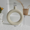 Matte ceramic dry flower vase with textured unglazed surface in Nordic design style