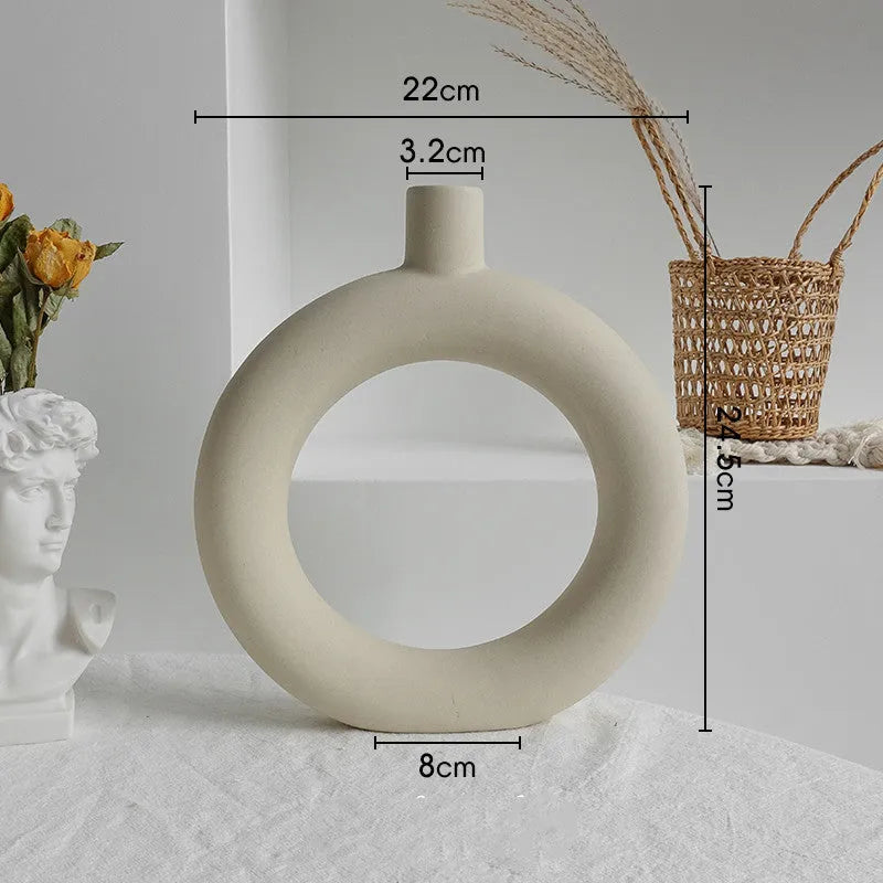 Matte ceramic dry flower vase with textured unglazed surface in Nordic design style