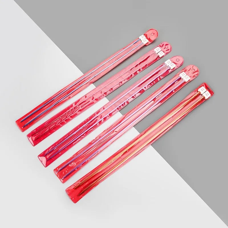 Aluminium crochet hook set showing 14 different sizes with protective plastic caps