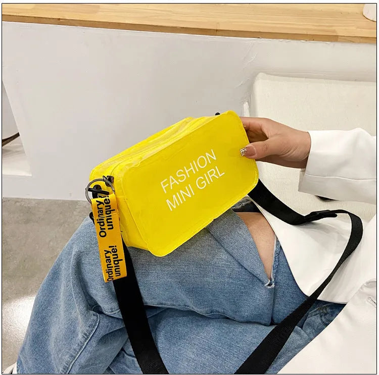 Transparent square women's shoulder bag with adjustable strap in multiple colour options showing internal mobile phone pocket