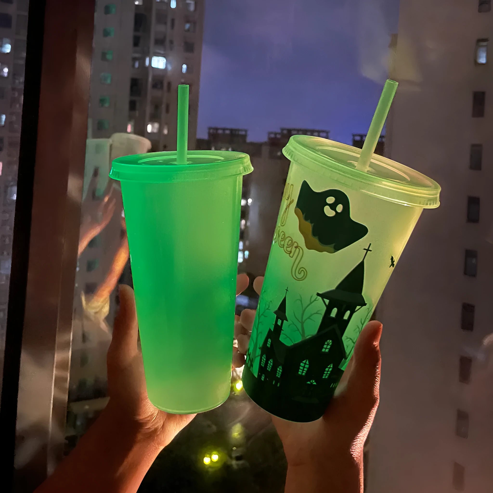 Halloween luminous reusable plastic sippy cup with straw, 720ml capacity, shown in one of six colours.