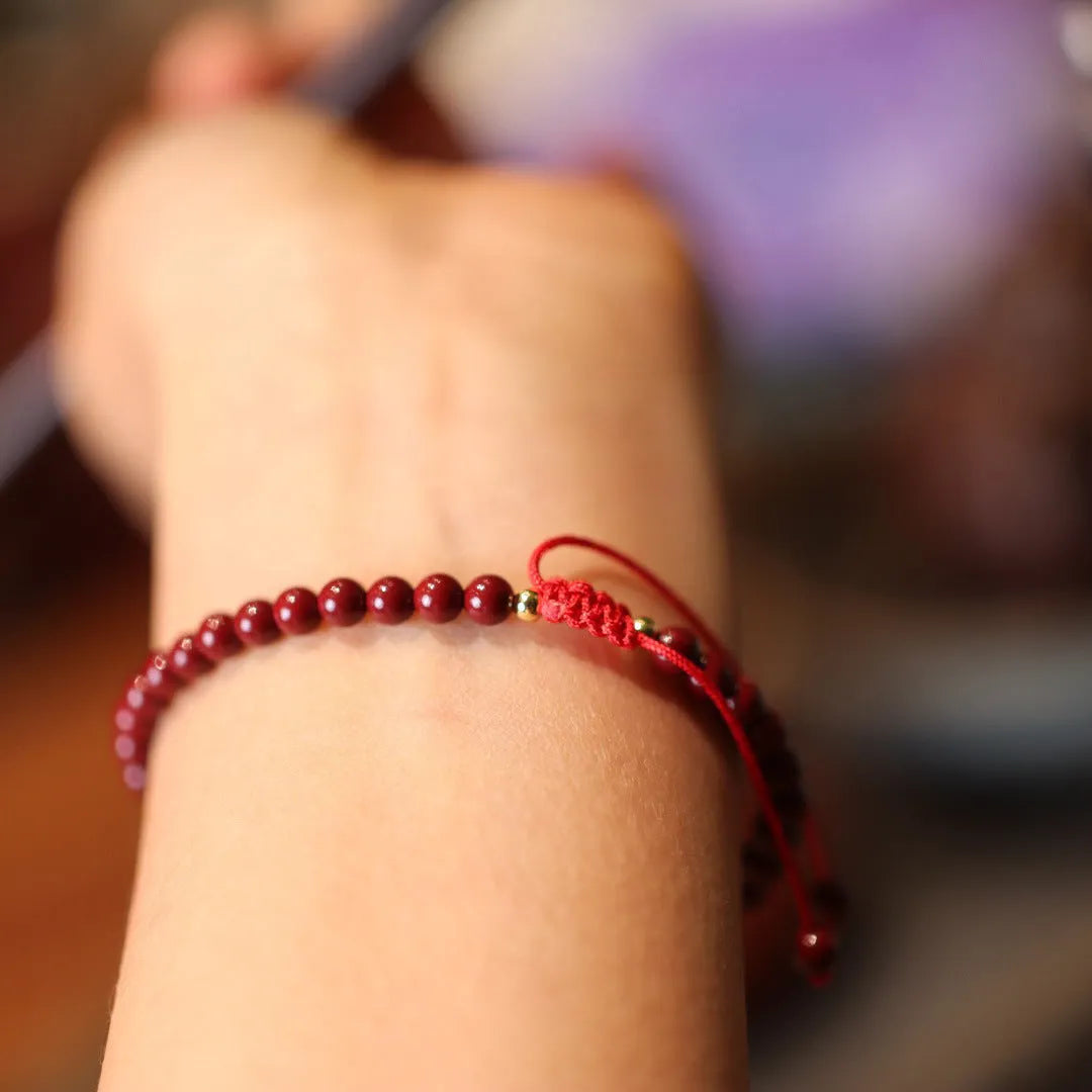 Natural cinnabar bracelet with purple gold sand design and geometric shape featuring auspicious patterns