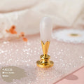 Wooden wax seal handle tool in various antique gold, silver, and coloured pearl cloud designs for sealing wax.