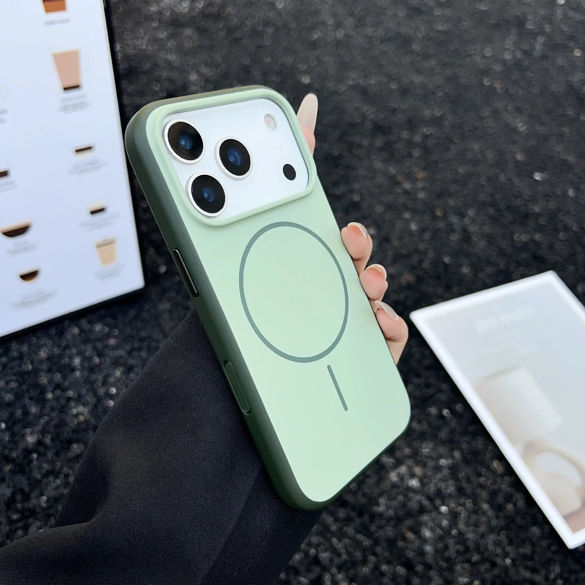 Frosted blue magnetic phone case for iPhone with a prominent AI camera button on the side.