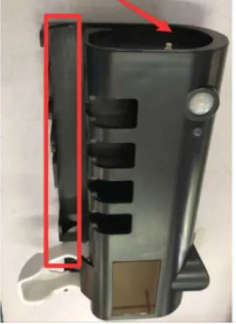 Black intelligent UV toothbrush steriliser and automatic toothpaste squeezer unit mounted on a bathroom wall.