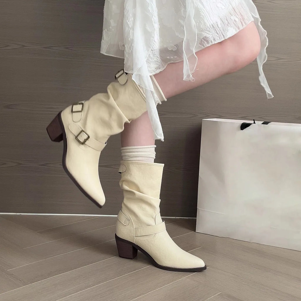 Women's mid-calf pointed toe chunky heel boots in white or khaki with PU upper and belt buckle detail