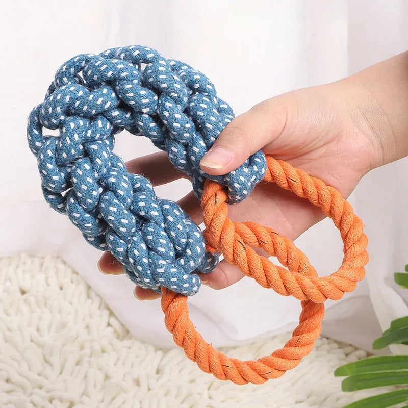 Blue double-ring braided cotton rope dog chew toy showing knot details and size against white background