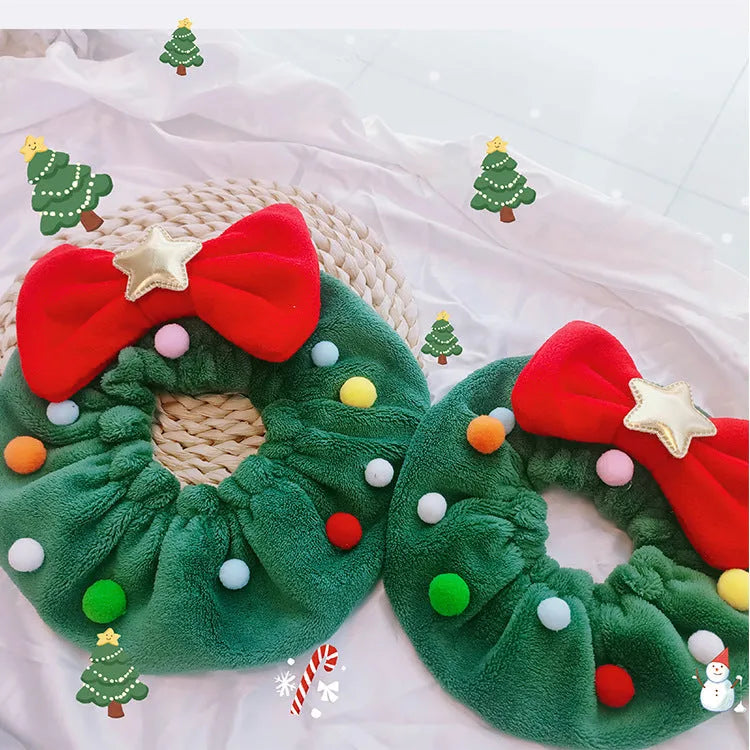 Green Christmas pet bow-knot collar with colourful fuzzy balls on a cat or dog for festive photo props