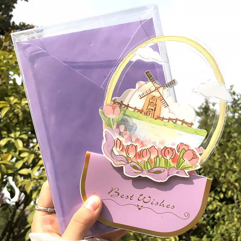 Handmade 3D butterfly-shaped greeting card with artificial flowers in a box, alongside its matching envelope.