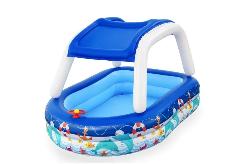 Boat type inflatable PVC sunshade paddling pool for children, 2.13m long, blue with yellow canopy, set up in garden