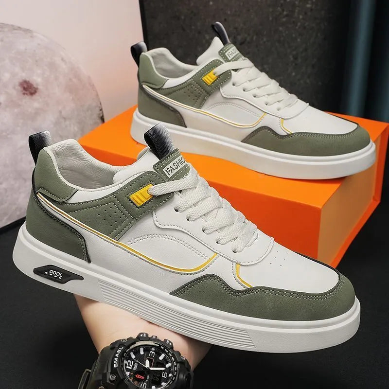 Men's low-top canvas board shoes in beige with leather stitching detail on a white background.