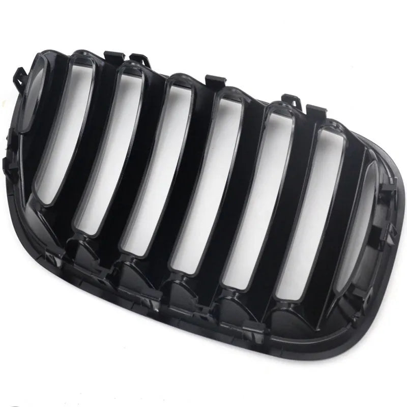 Bright black ABS plastic mesh grille for BMW X5 E53 front end.
