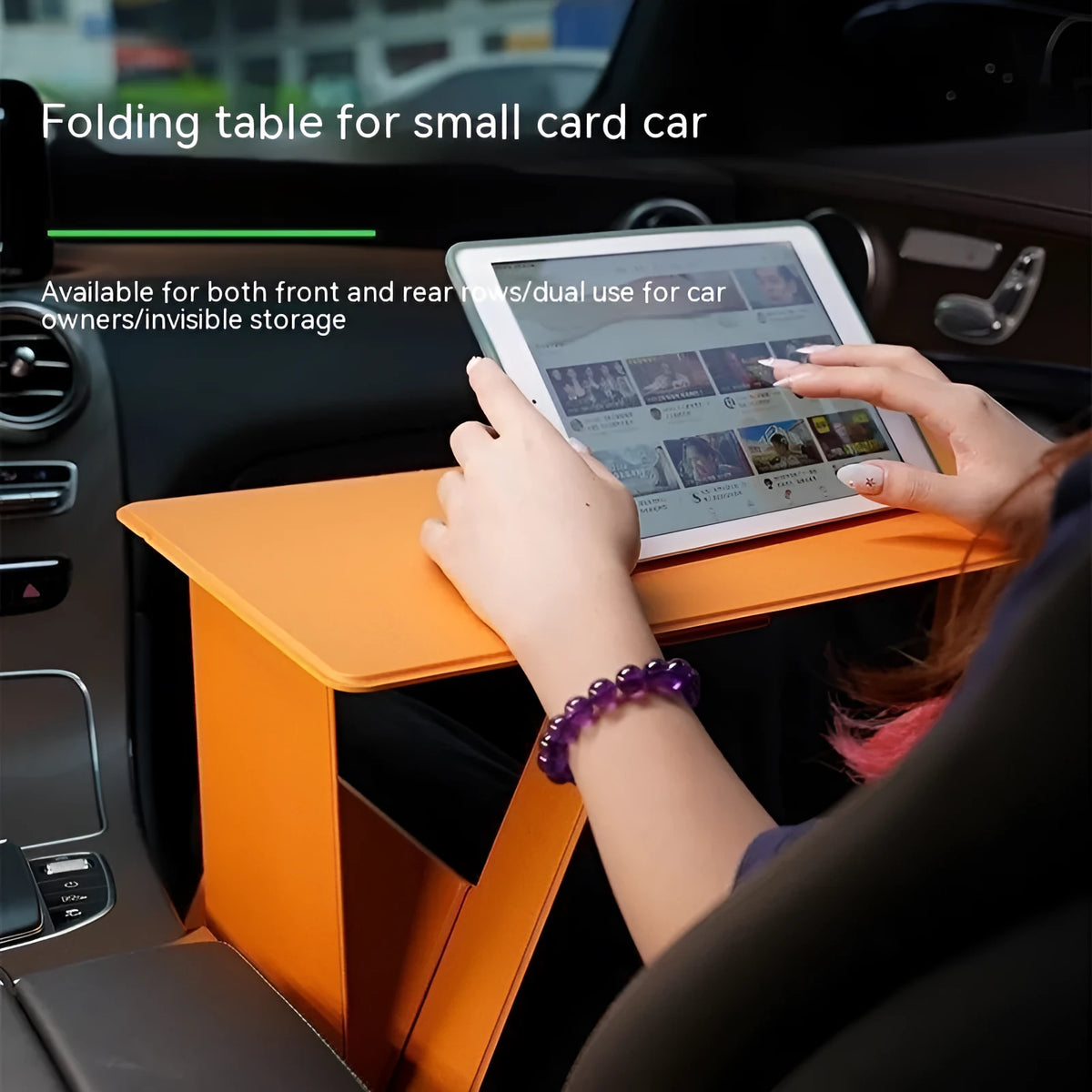 Foldable wooden laptop stand in black with storage area and folded legs on a flat surface