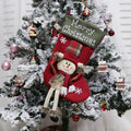 Set of three large Christmas stockings with 3D applique Santa, Snowman, and Reindeer designs on a white background